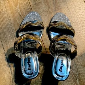 Silver sandals bought from Pakistan . Worn twice and In good condition.